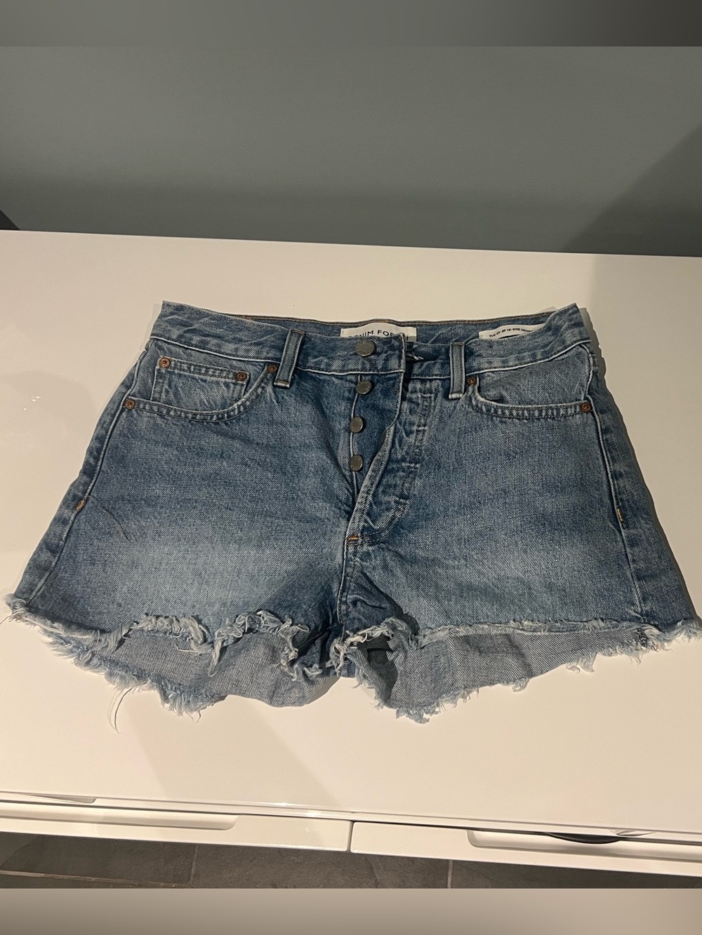 Denim Forum Distressed Mid-Blue Button-Fly Jean Shorts